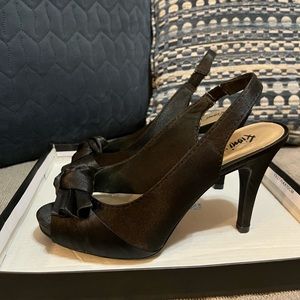 Black, satin heels in size 6